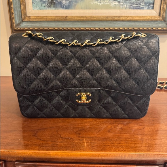 CHANEL Handbags - Chanel Black Caviar Jumbo Classic Double Flap with GHW